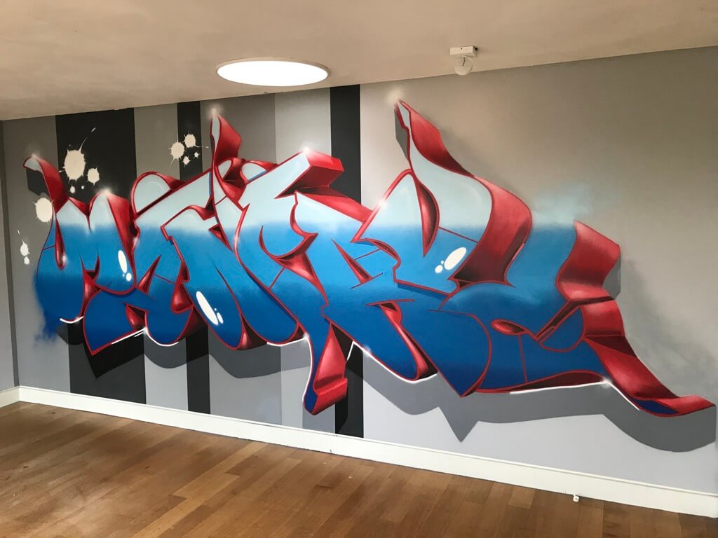 Years later, (2008-2020) in the midst of 2020, Stan had grown into a young man, and his parents asked Theron to create two masterful graffiti pieces in their new home. Eagerly accepting the challenge, Theron embarked on the task. The father's wish was to have a graffiti piece in his man cave, and without hesitation, Theron designed an incredible piece with the word "Mancave." Within a few days, Theron brought color and life to the walls, reflecting the agreed-upon designs. The family members were all exceptionally pleased with the final result. Theron found joy in knowing that the father proudly attended his team meetings with the graffiti as a vibrant backdrop. Simply beautiful!