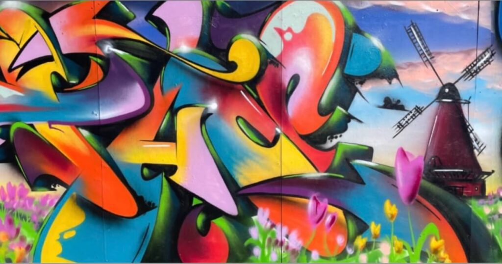 During this year’s Liberation Festival in Almere city, a special graffiti jam took place, where Theron and Silak created an impressive collaborative piece. The artwork is entirely in their signature style, bursting with vibrant colors and energy. A big thank you to the organizers and the city of Almere for making these creative expressions possible and for supporting street art. A feast for the eyes and a beautiful tribute to freedom and art!